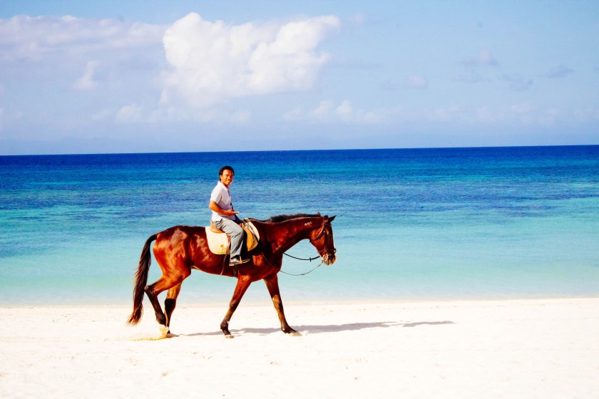 Horseback riding on the beach in Balesin