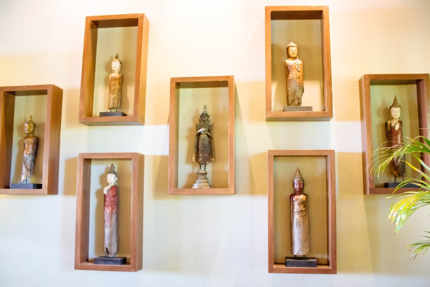 small statues on the wall